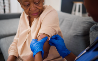 Elderly woman receiving healthcare.